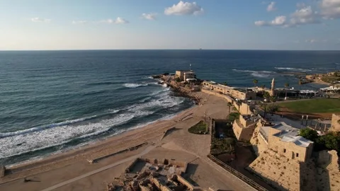 High static drone view over Caesarea National Park in Israel showing ancient Stock Footage 322764556