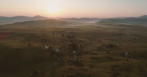 High sunrise in the mountain plane  Video stock 99611416