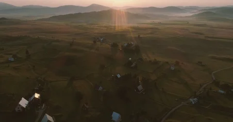 High sunrise in the mountain plane  Video stock 99614116