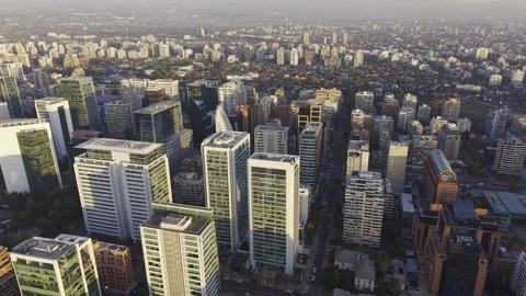 High sunset drone panorama over Apoquindo and Las Condes Santiago Chile Vídeos de archivo 334683279
