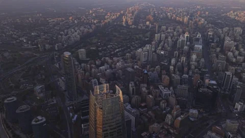 High sunset drone pullback above Titanium La Portada Santiago Chile Vídeos de archivo 334637120