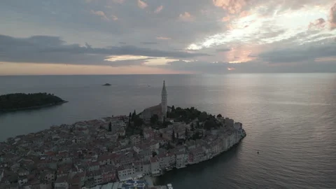 High Sunset Orbit Over Rovinj Church in 4K Stock Footage 258371451