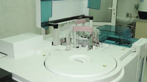 High-tech automated analyzer for clinical blood testing in a medical laboratory. Stock Footage 329998300