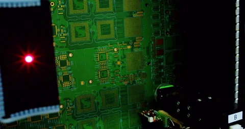 High-tech automated machine assembling an electronic Stock Footage 332990524