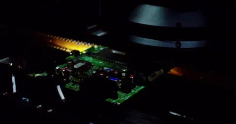 High-tech automated machine assembling an electronic Stock Footage 332991265