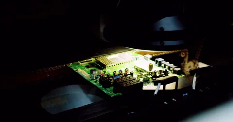 High-tech automated machine assembling an electronic Stock Footage 332991906