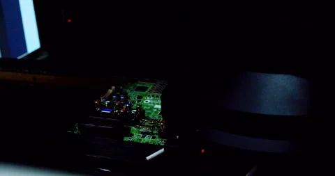 High-tech automated machine assembling an electronic Stock Footage 332992699