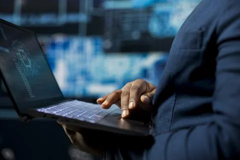 High tech black IT expert working with AI brain data structures environment Stock Photos