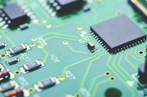 High-tech board with electronic components and microchips Stock Photos