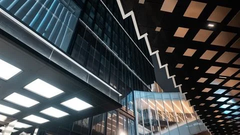 High tech ceiling with LED lighting and geometric pattern in modern building Stock Photos
