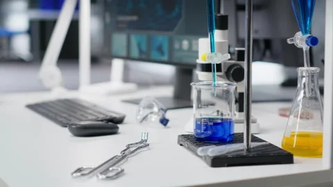 High tech chemistry lab equipment and computer in empty research facility 스톡 동영상 317784265