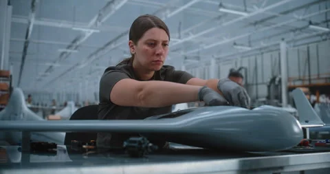 High Tech Defense Industry Worker Integrating Payload into Reconnaissance Drone Stock Footage 345054734