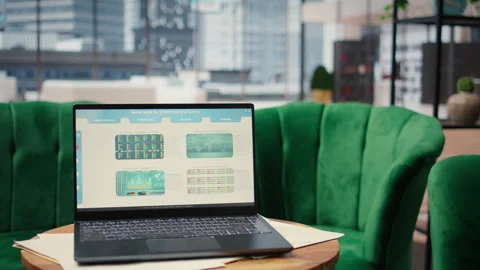 High tech device showcasing infographics and business data in empty office Stock Footage 317274144