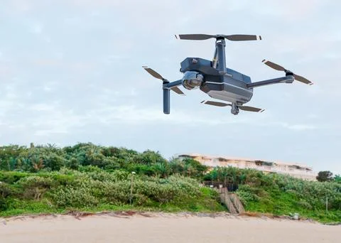The high-tech drone flying in the sky. Drone with professional camera takes.. 스톡 일러스트