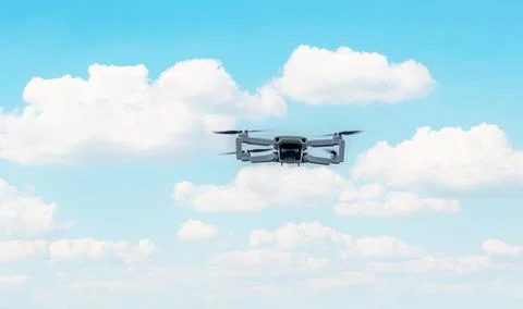 A high-tech drone in the sky . Stock Photos