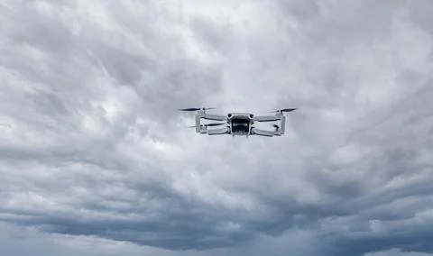 A high-tech drone in the sky . Stock Photos