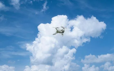 A high-tech drone in the sky . Stock Photos