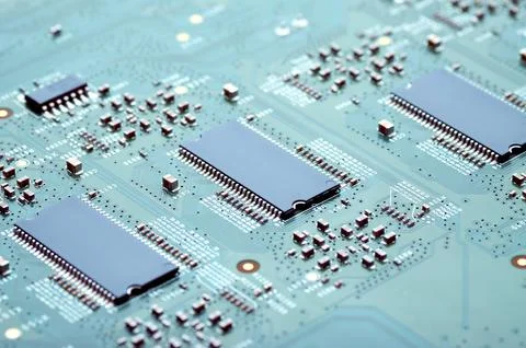 High-tech electronic board with microprocessors and electronic parts close-up Stock Photos