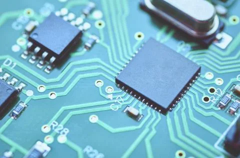 High-tech electronic board with processor and electronic components Stock Photos