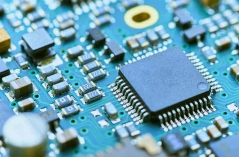 High-tech electronic board with processors and microchips close-up Stock Photos