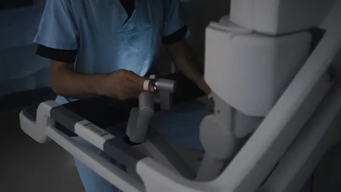 High-tech equipment: surgical robot control by doctor in Modern operating room Stock Footage 102218368