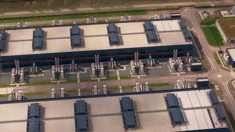 High-tech facility with data halls surrounded by flat fields Stock Footage 307490212