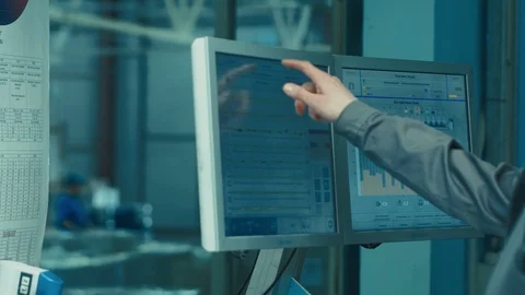 On High Tech Factory Engineer Uses Computer for Programing Pick and Place Stock Footage 106635225