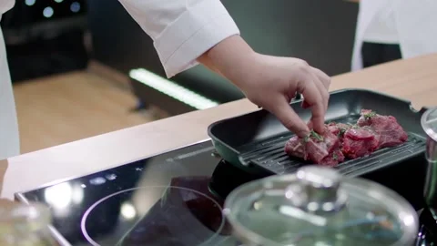 High tech kitchen. Cooking meat Stock Footage 141601296