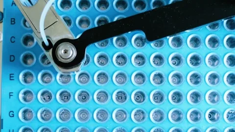 High-tech laboratory automation system, mechanical robotic arm working on blue Video stock 278359332