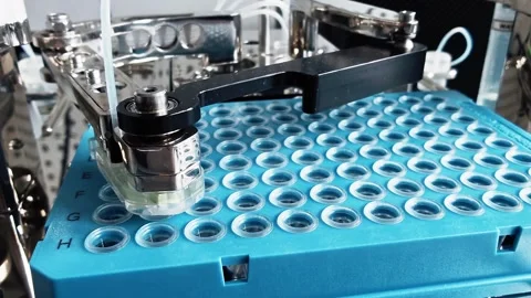 High-tech laboratory automation system, mechanical robotic arm working on blue Stock Footage 278359778