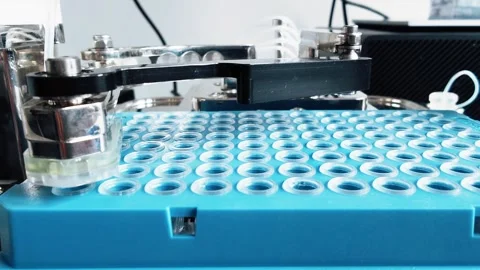 High-tech laboratory automation system, mechanical robotic arm working on blue Stock Footage 281426676