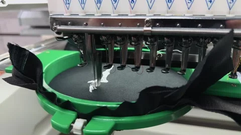 High-Tech Machine for Custom Logo Embroidery on Black Textile Material Prof.. 스톡 동영상 332205784