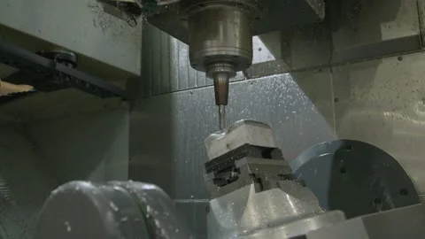 High tech machine manufactures complex steel part with CNC Machine automation Stock Footage 136784142