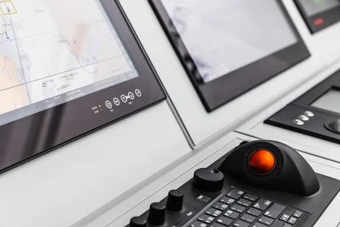 High-tech marine navigation console on a ship bridge Stock Photos