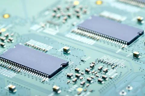 High-tech microprocessors and electronic components on the board close-up Stock Photos