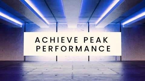 High-tech neon room with glowing screen text Achieve Peak Performance Stock Footage 312544006