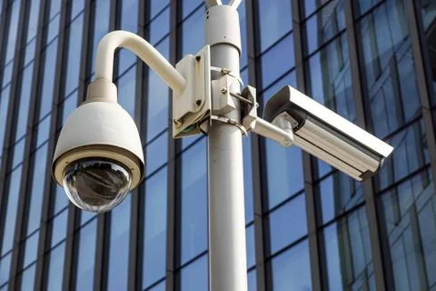 High tech overhead security camera at a government owned building. Stock Photos