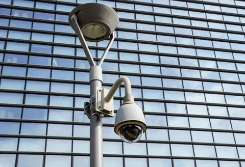 High tech overhead security camera at a government owned building. Stock Photos