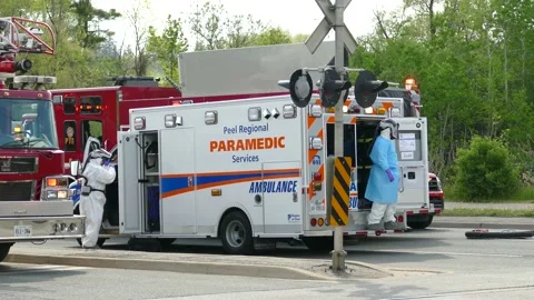 High tech paramedic coronavirus uniforms wore by Peel Paramedics in Canada Stock Footage 133972734
