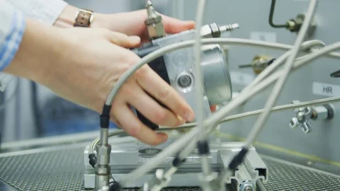 High Tech Production Plant - Engineer testing in laboratory Stock Footage 98648562