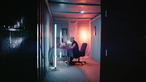 High Tech Programmer Surrounded by Glowing Screens Stock Footage 341656096