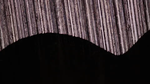 High-tech steel alloy under microscope. Raw material for production of medical  Stock Footage 268490682