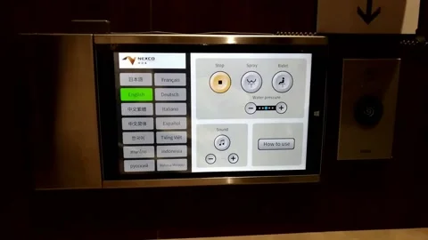 High tech touch panel display of instructions on how to use the toilet Stock Footage 153975304