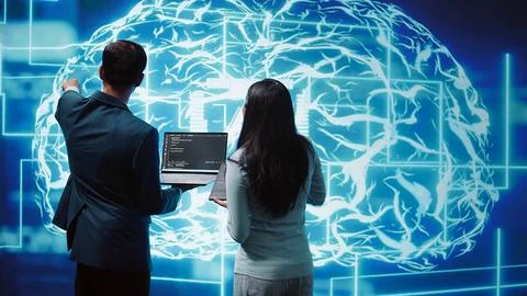 High tech workspace colleagues using AI system, doing brainstorming 库存照片