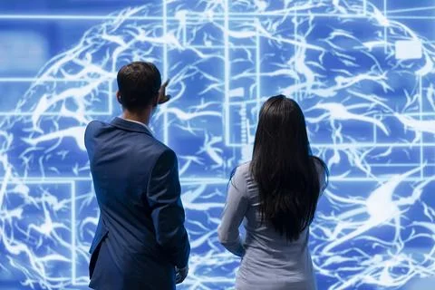 High tech workspace colleagues using AR visualization of AI system Stock Photos