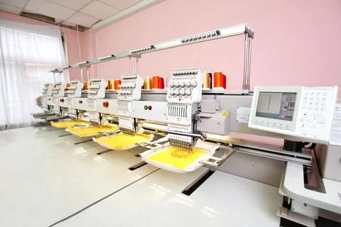 High technology automatic sewing machine control by computer programming. Sew Stock Photos