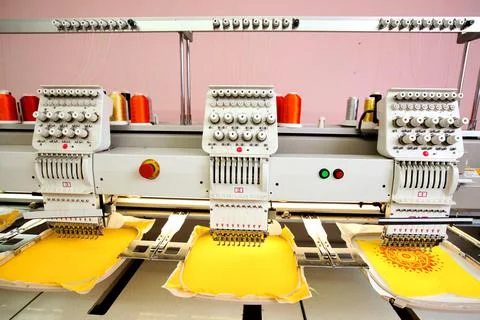 High technology automatic sewing machine control by computer programming. Sew Stock Photos