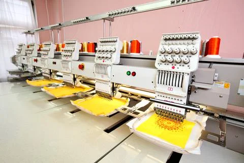 High technology automatic sewing machine control by computer programming. Sew Stock Photos