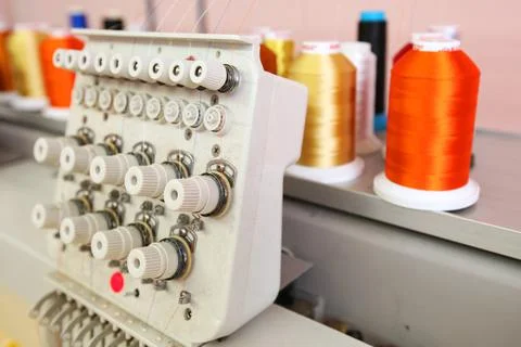 High technology automatic sewing machine control by computer programming. Sew Stock Photos