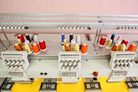 High technology automatic sewing machine control by computer programming. Sew Stock Photos